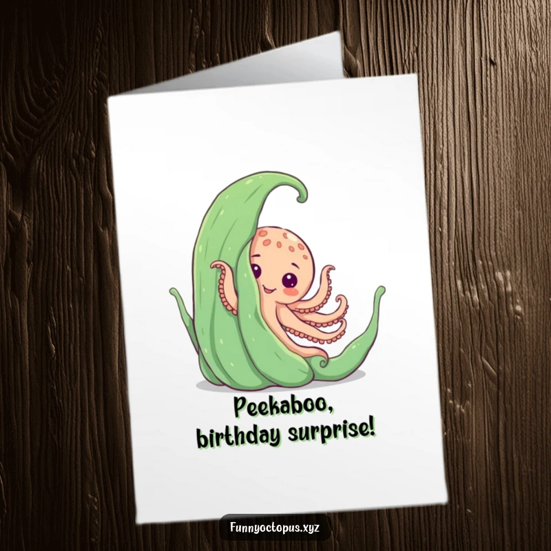 Funny Free Printable Birthday Card: An octopus playfully peeking with a mischievous grin from behind a large, green piece of seaweed.